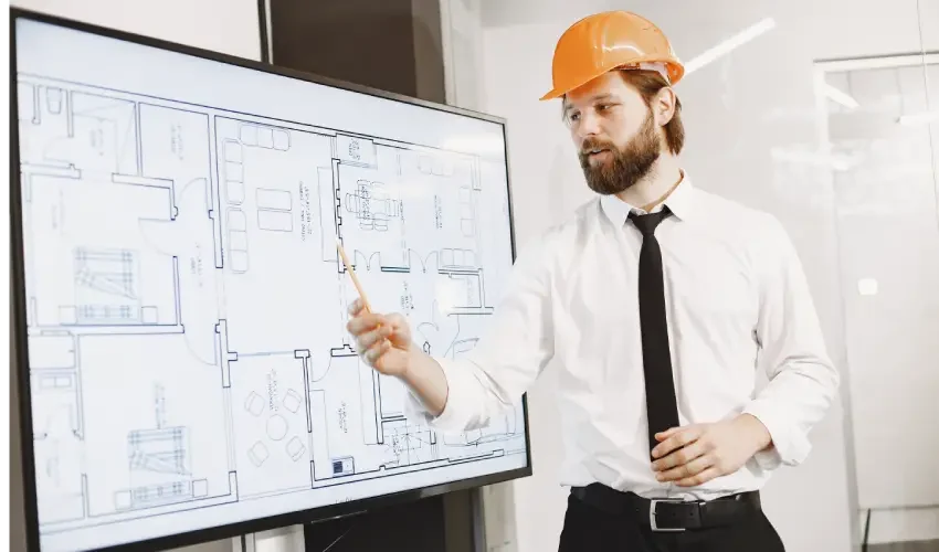 architect-engineer-man-shows-plan-building-tv-screen