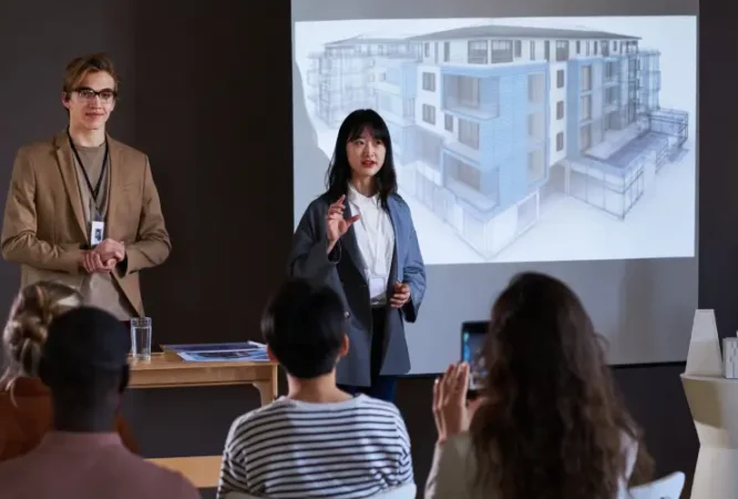 business-people-presenting-new-building-2025-02-11-15-31-23-utc